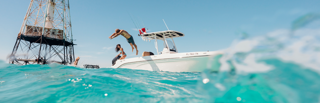 Boateka Used Boat Tiers - boy jumping off boateka boat