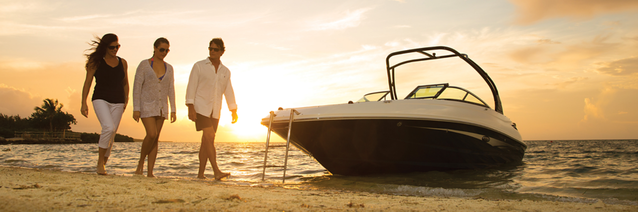 Family on lake with pontoon