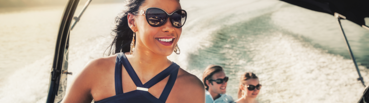woman in sunglasses on premium boat